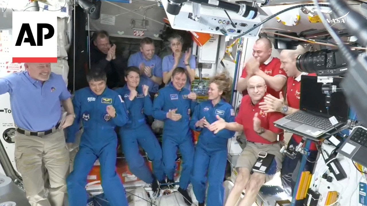 NASA’s stuck astronauts welcome their replacements to the space station