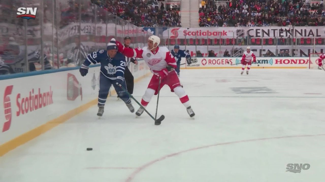 Chris Chelios grabs Tie Domi's Toque and throws it at him